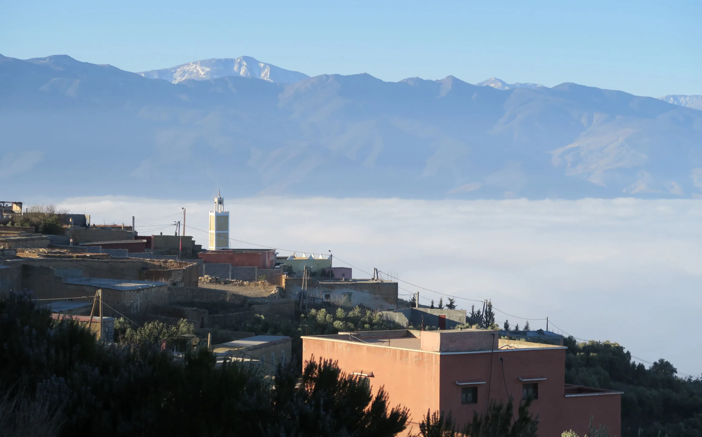 View of Ouizen village with a sea of cloud, Aguergour, Morocco