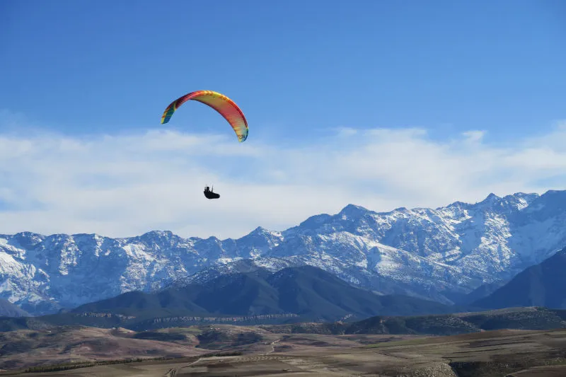 Fred flying with Atlas mountains in the background